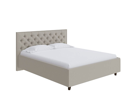 Кровать 120х200 Teona - Кровать с высоким изголовьем, украшенным благородной каретной пиковкой.